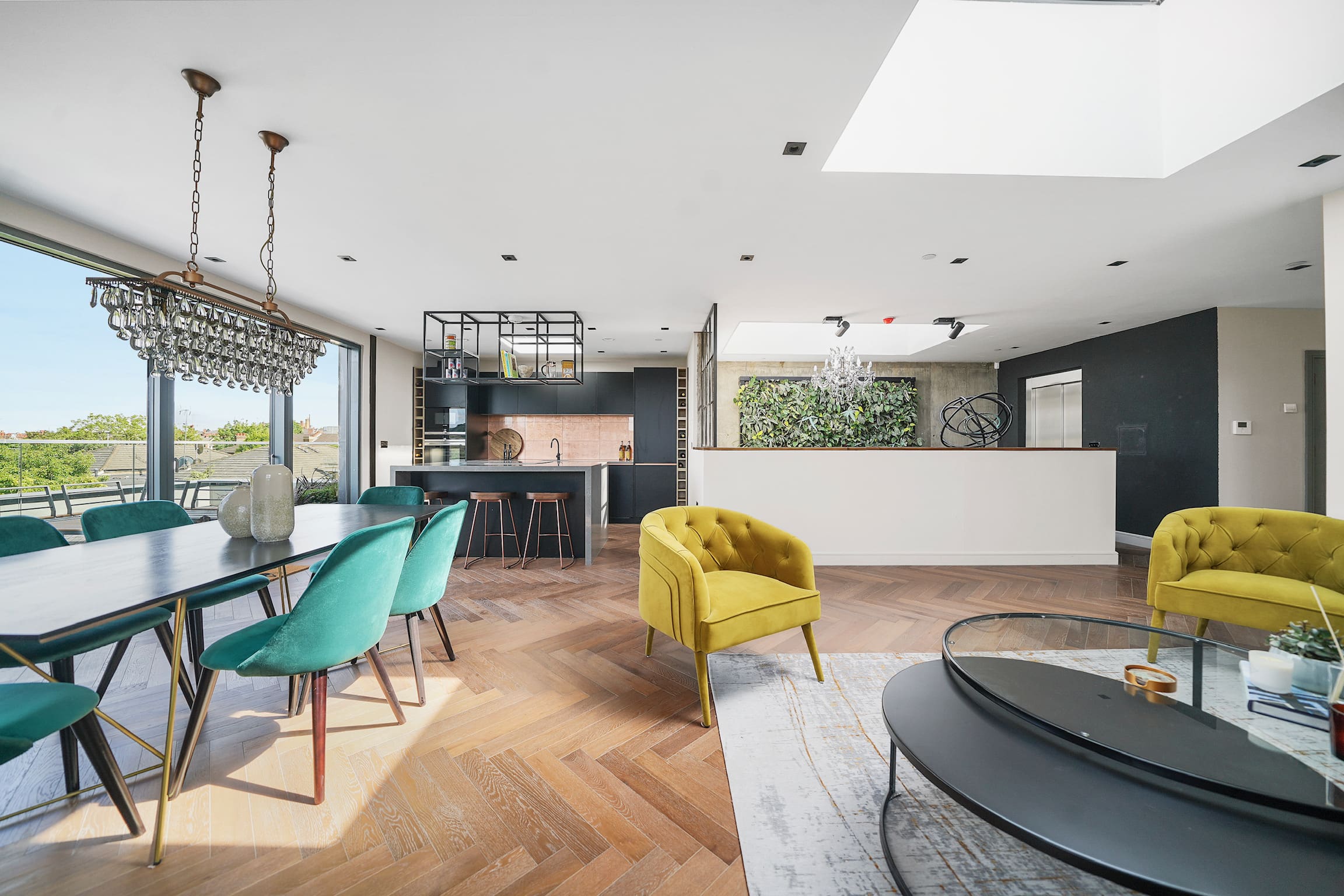 A living room with chairs and tables in it